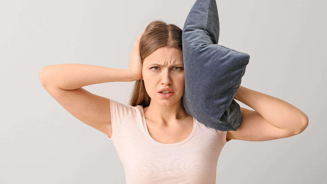 How to Block Out Snoring and Get a Good Night's Sleep