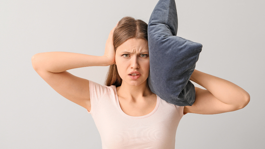 How to Block Out Snoring and Get a Good Night's Sleep
