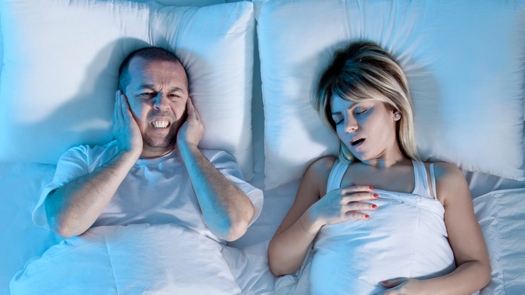 Tips on How to Get a Good Night's Sleep When Your Partner Snores
