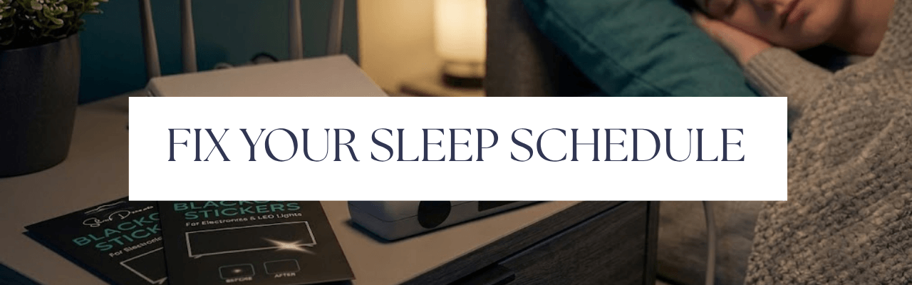 A woman sleeping with an extension cord and packaging of blackout lights on top of the table with overlay text Fix Your Sleep Schedule