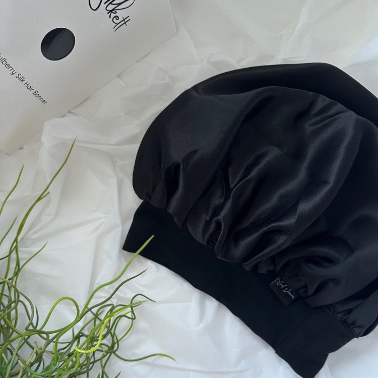 black 100% mulberry silk hair bonnet and packaging