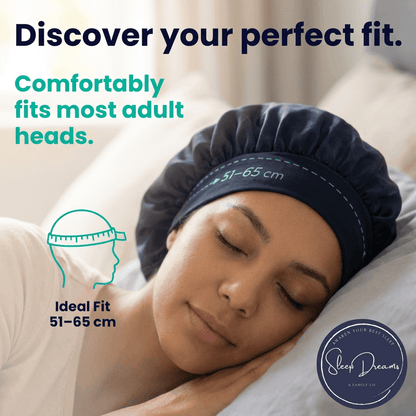 a woman lying down against the pillow wearing a premium Silkett, a 100% Mulberry Silk Bonnet with an ideal fit of 51 to 65 cm.
