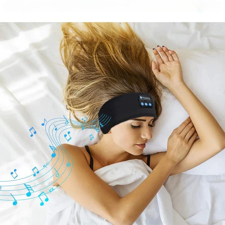 women wearing bluetooth headband headphones in bed