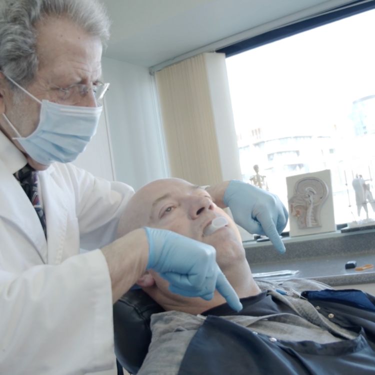 man using mouth guard for teeth grinding