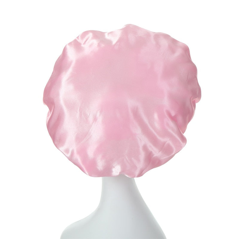 back of baby pink satin hair bonnet for sleep